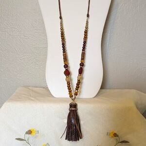 1948 Long Leather Tassel Necklace with Leather, Crystal, and Wood Beads.